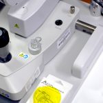 Aston Vision Sciences Fluorescein filter next to Slit Lamp ready for dry eye testing