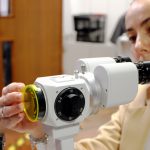 AVS Fluorescein Filter being held in place by hand